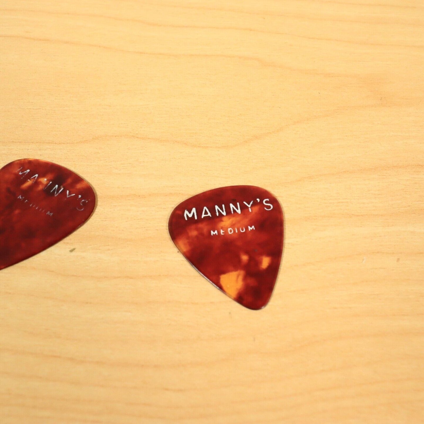 (2) Vintage Manny's Music New York City Faux Shell Guitar Pick Rare, Medium