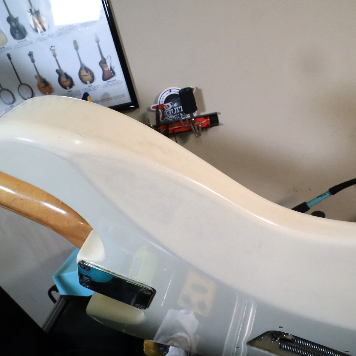 Close-up of upper body bout and neck joint plate