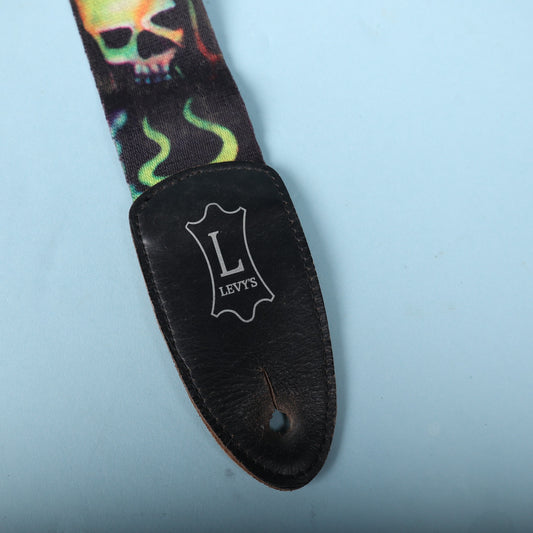 Close-up of the black leather end tab featuring the silver Levy's shield logo.