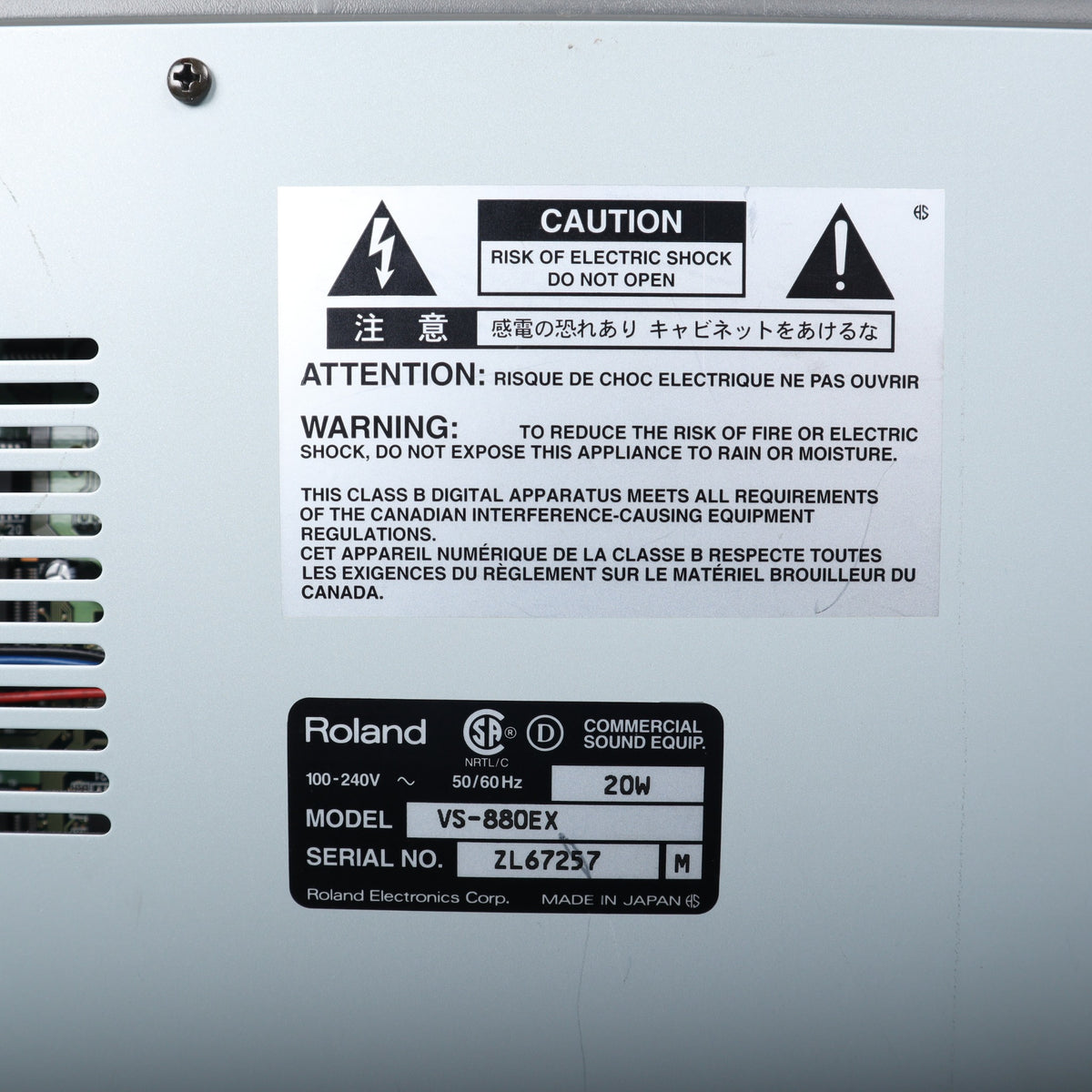 Rear label on Roland VS-880EX showing model number, serial number ZL67257, and Made in Japan marking.