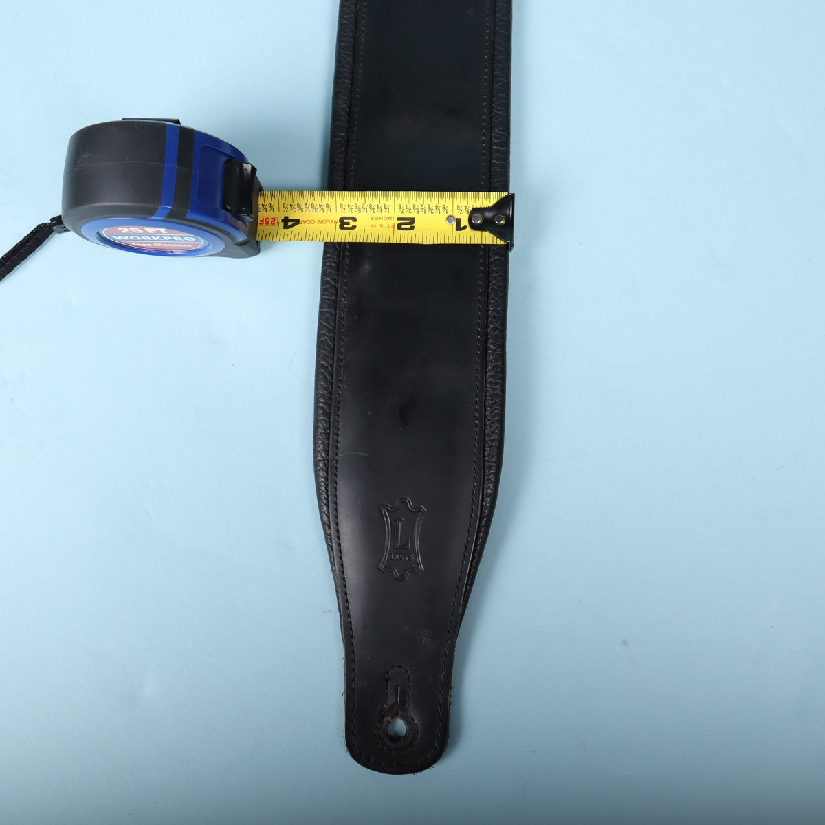 Levy's padded bass strap with tape measure showing 3-inch width.