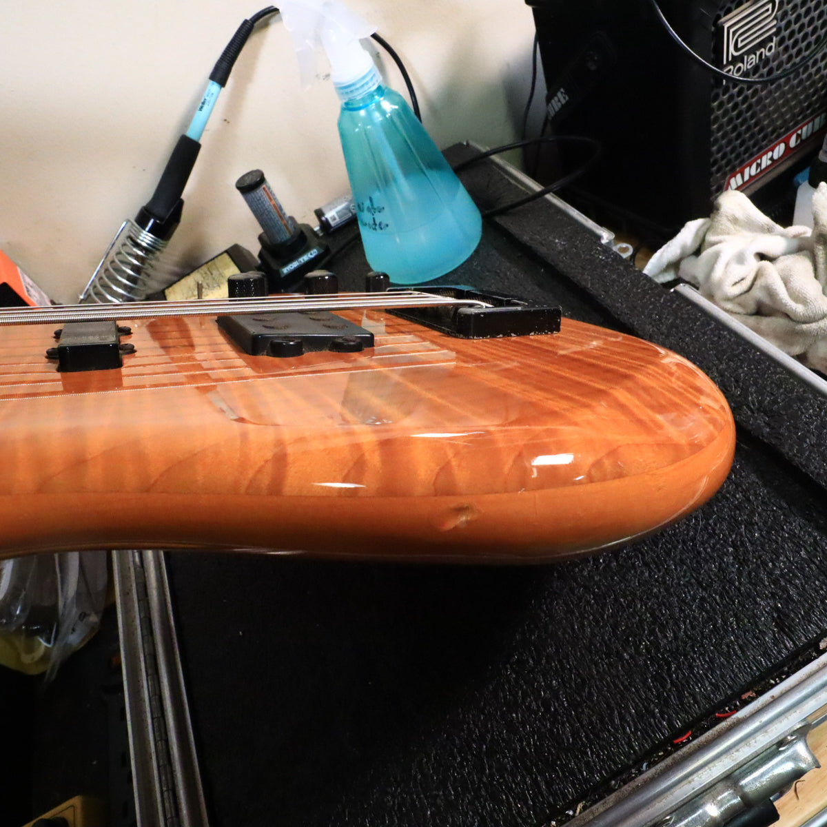 Side rim of the body showing a small indentation in the clear finish.