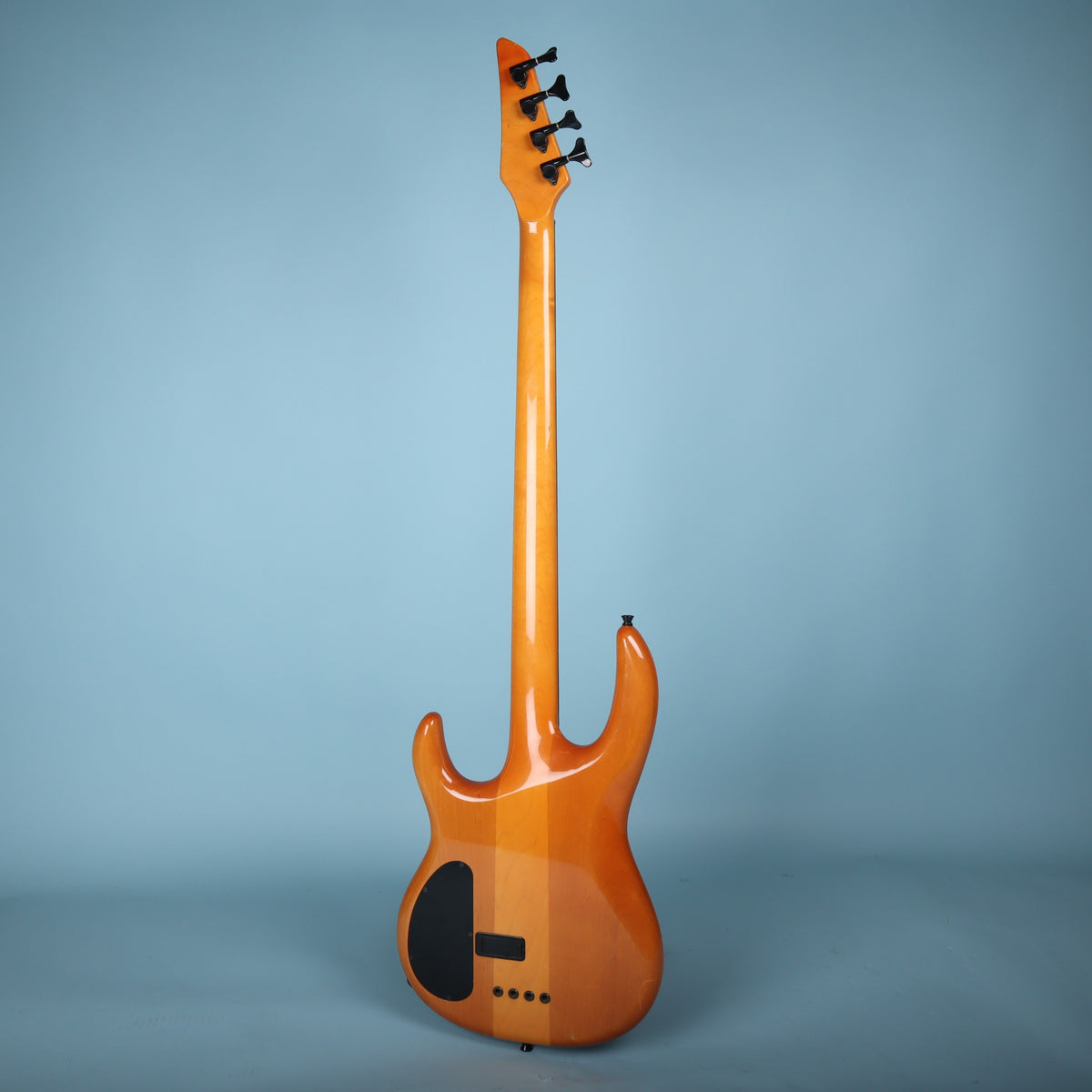 Full rear view of the Carvin LB70 electric bass showing the one-piece neck-through design.