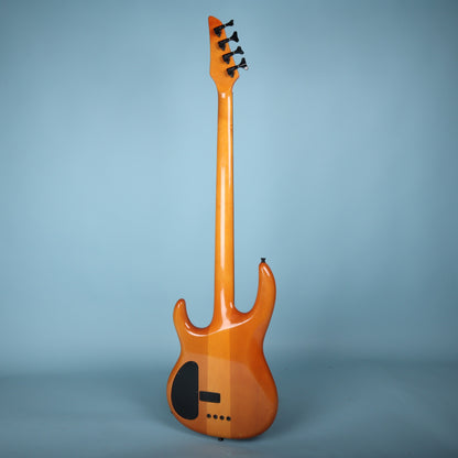 Full rear view of the Carvin LB70 electric bass showing the one-piece neck-through design.