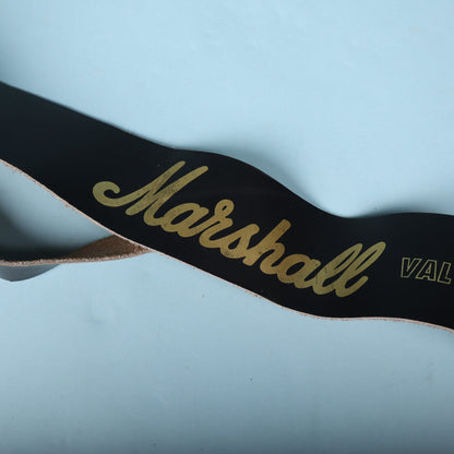 Detailed view of the gold Marshall logo lettering across the strap body