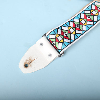 Close-up view of the opposing white leather tab and metal ring loop on the Authentic Hendrix strap