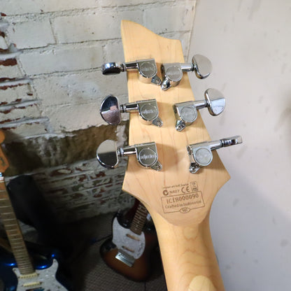 Close-up of the back of the headstock showing serial number IC18000090 and Crafted in Indonesia stamp..120 chars max achieved