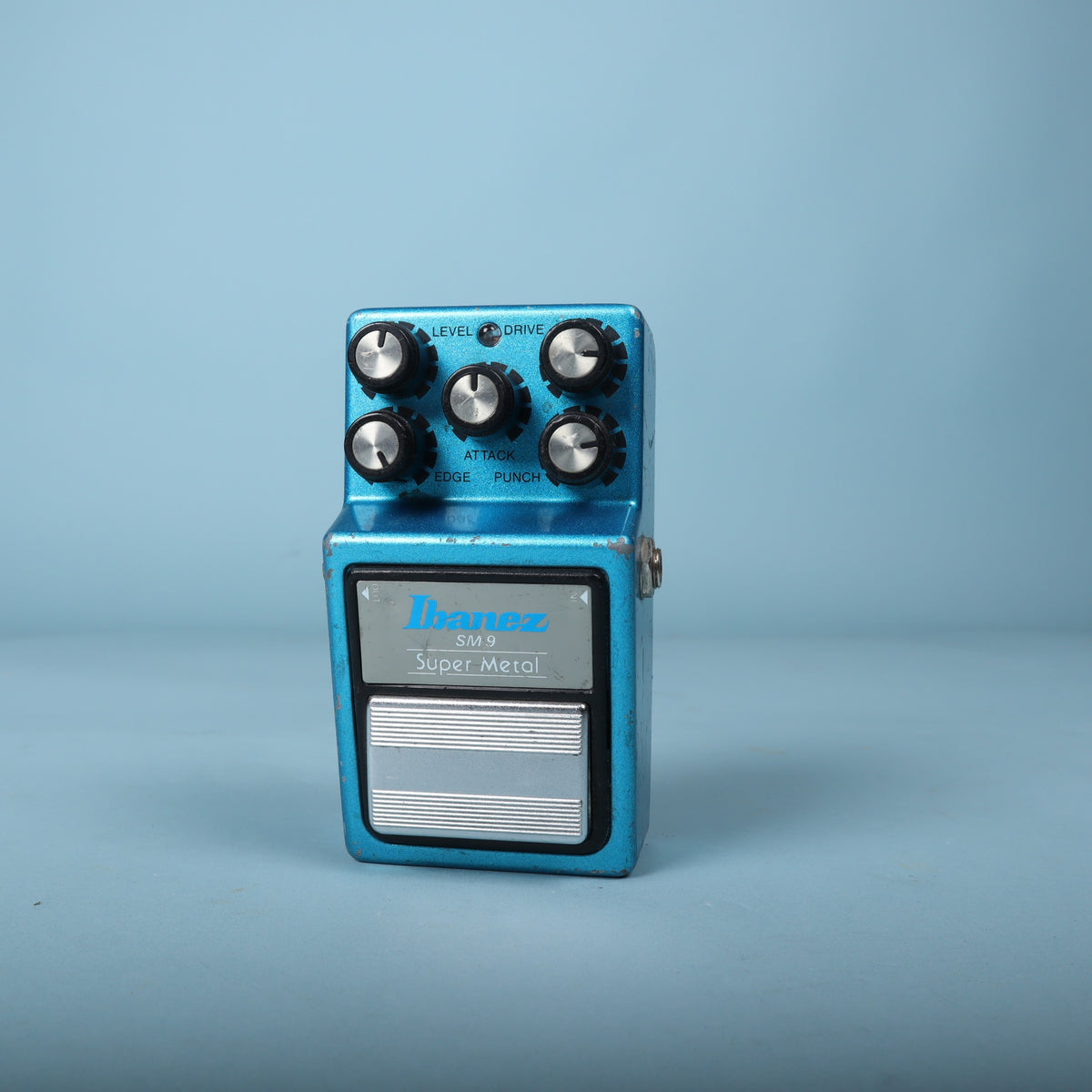 Direct overhead view of the Ibanez SM9 Super Metal showing all five knobs and switch