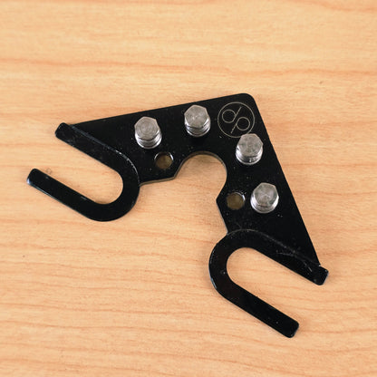 Overhead view of the black Dietrich Parts String Butler V3 showing mounting cutouts