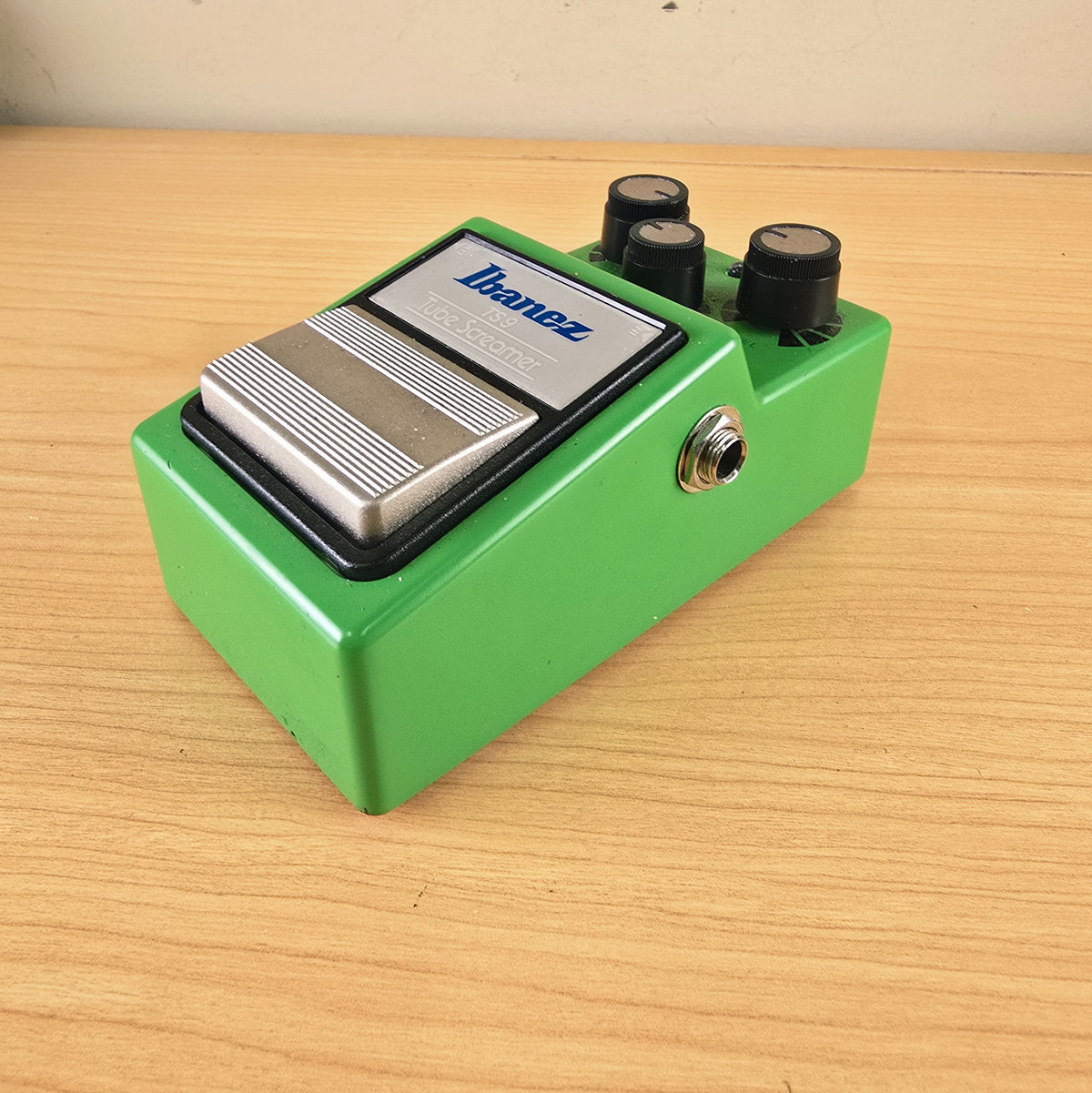 Front three-quarter perspective of the green Ibanez TS9 Tube Screamer.
