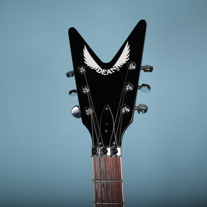 Dean ML V-shaped headstock face with white winged logo and ML truss rod cover