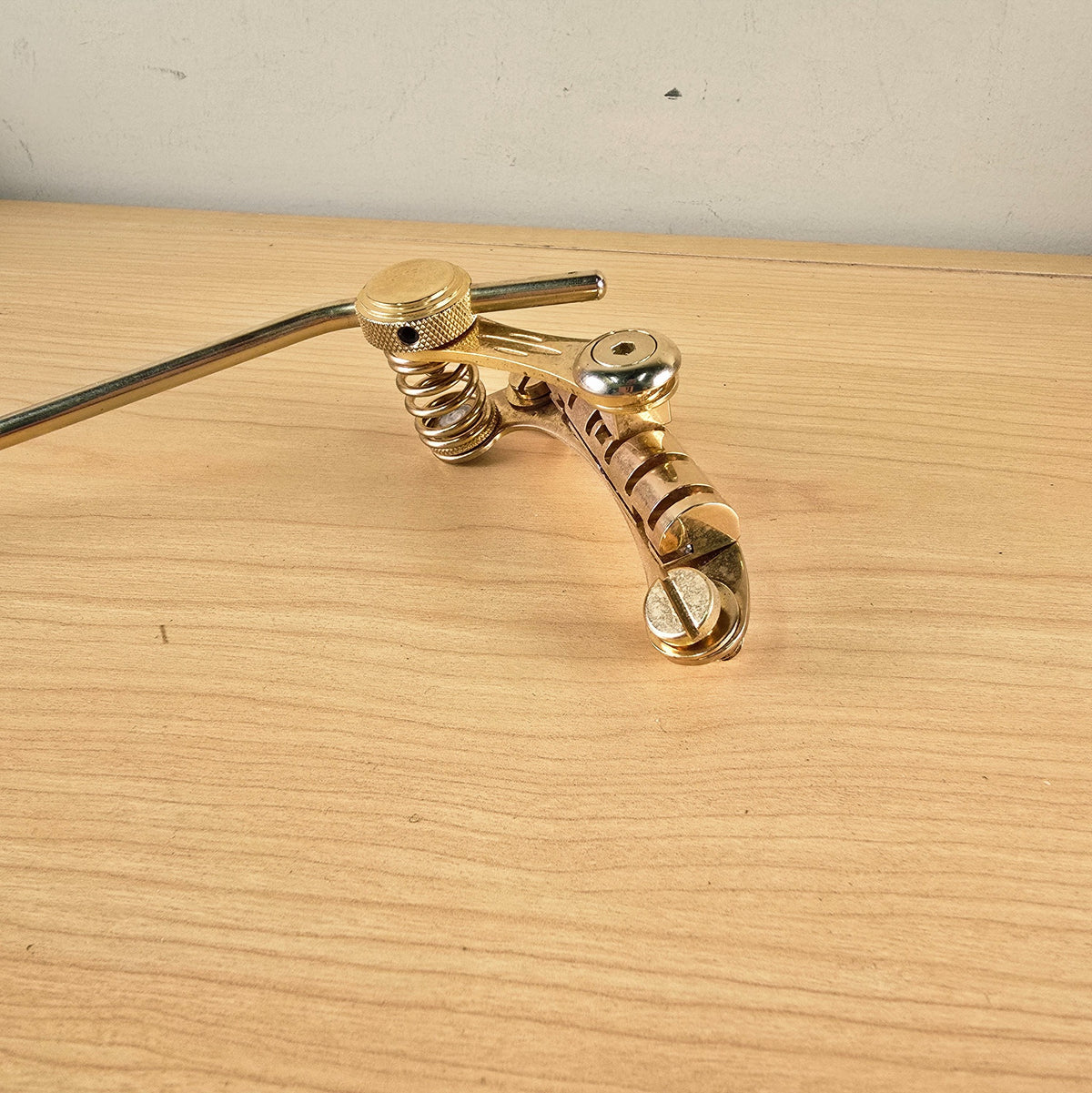 Angled profile view highlighting the Duesenberg Les Trem II tension spring and tremolo arm mount
