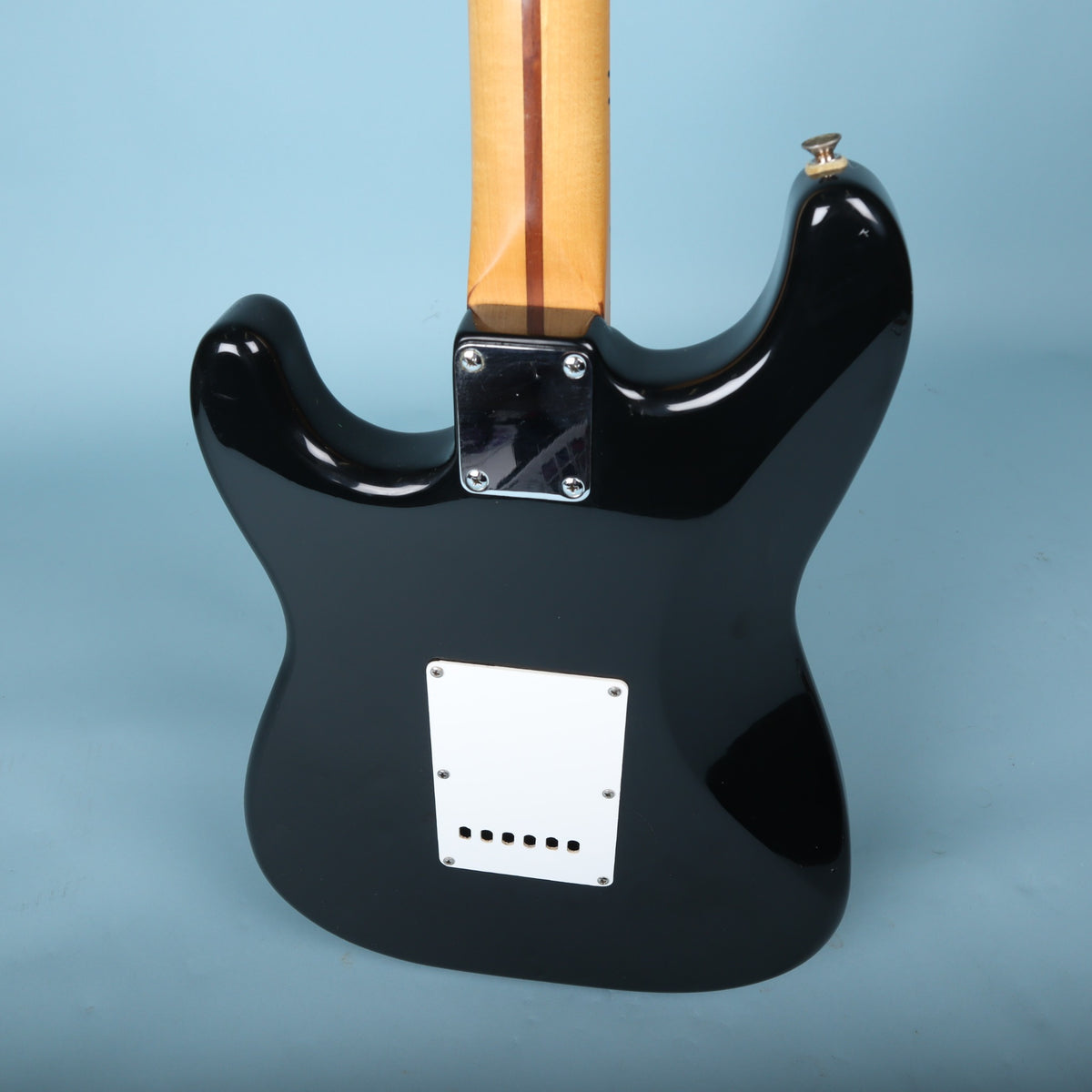 Rear angled view showing the back of the body and lower horn