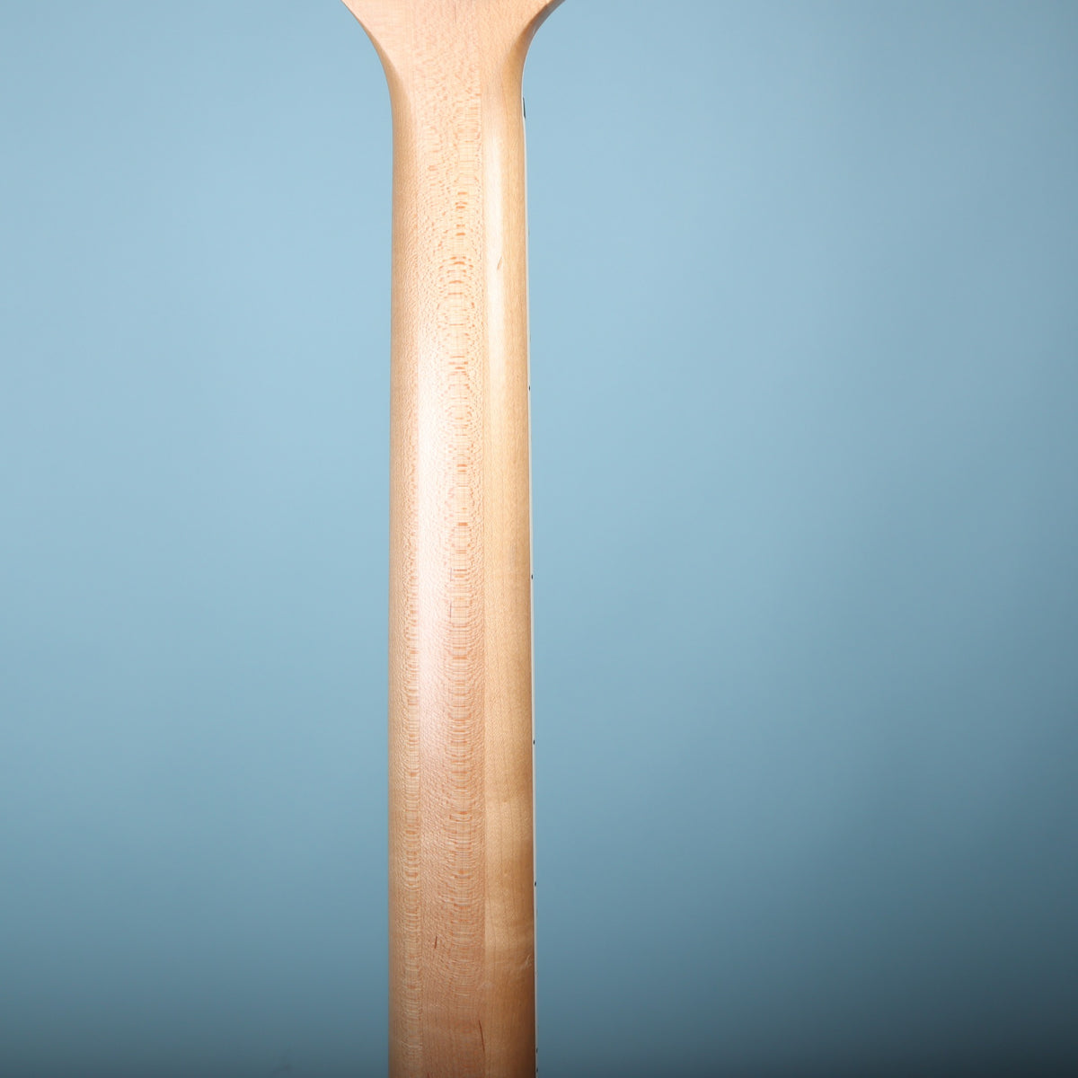 Back profile view of smooth satin maple neck of Ibanez RGA42