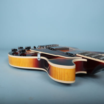 Treble-side profile showing the elevated tortoise pickguard and pickup rings.