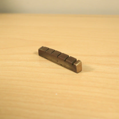 1980s Vintage Mighty Mite Strat Brass Guitar String Slotted Nut 9.5 radius