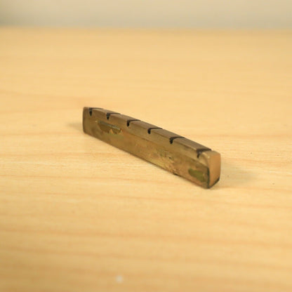 1980s Vintage Mighty Mite Strat Brass Guitar String Slotted Nut 9.5 radius