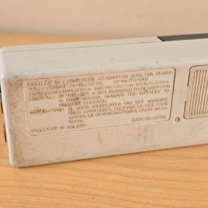 Detail of embossed technical specifications and Made in Japan lettering on rear housing.