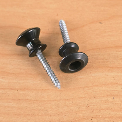 Dunlop Straplok black strap buttons shown from side and face angles with wood screws