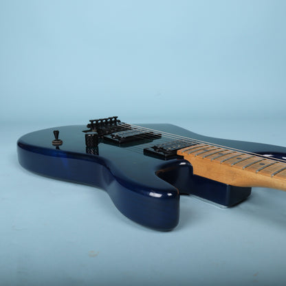 Top angled view of guitar body and cutaway