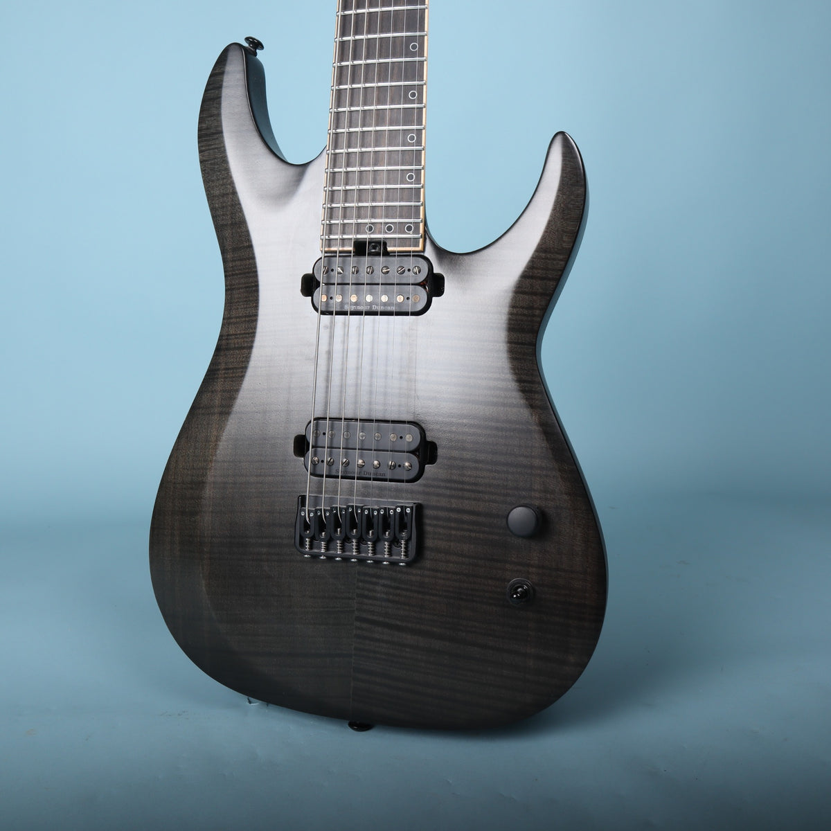 Schecter KM-7 MK-II 7-string electric guitar body front in See-Thru Black Pearl finish