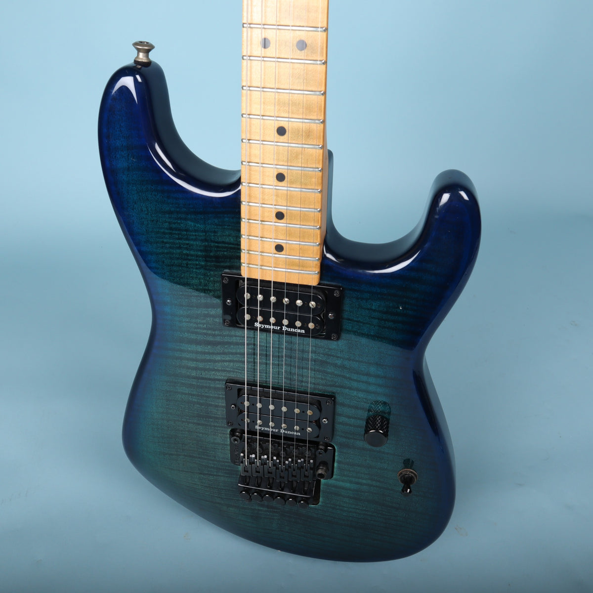 Angled front body view of Charvel electric guitar