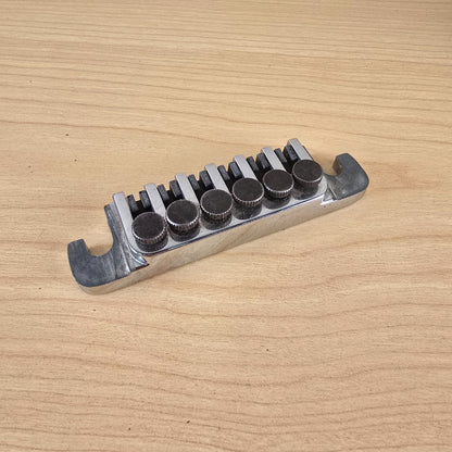 Rear angle view showing the chrome body and fine tuning screws of the TP-6 tailpiece