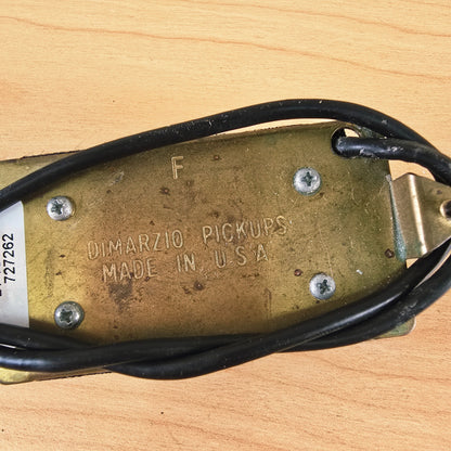 Close-up of baseplate showing stamped F and DiMarzio Pickups Made in USA text