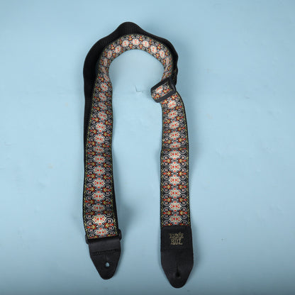 Full view of the Ernie Ball jacquard guitar strap showing both leather end tabs