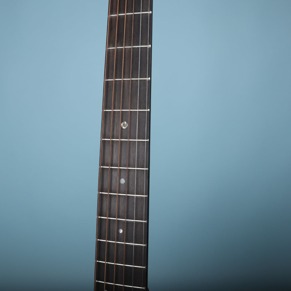 Front view of the Martin 0-18 ebony fretboard showing frets and pearl position dot inlays.