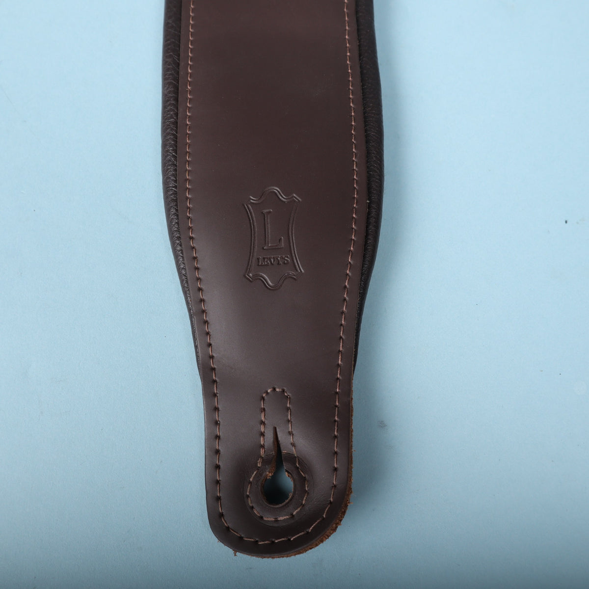 Detailed view of the embossed Levy's shield logo and reinforced lower strap hole