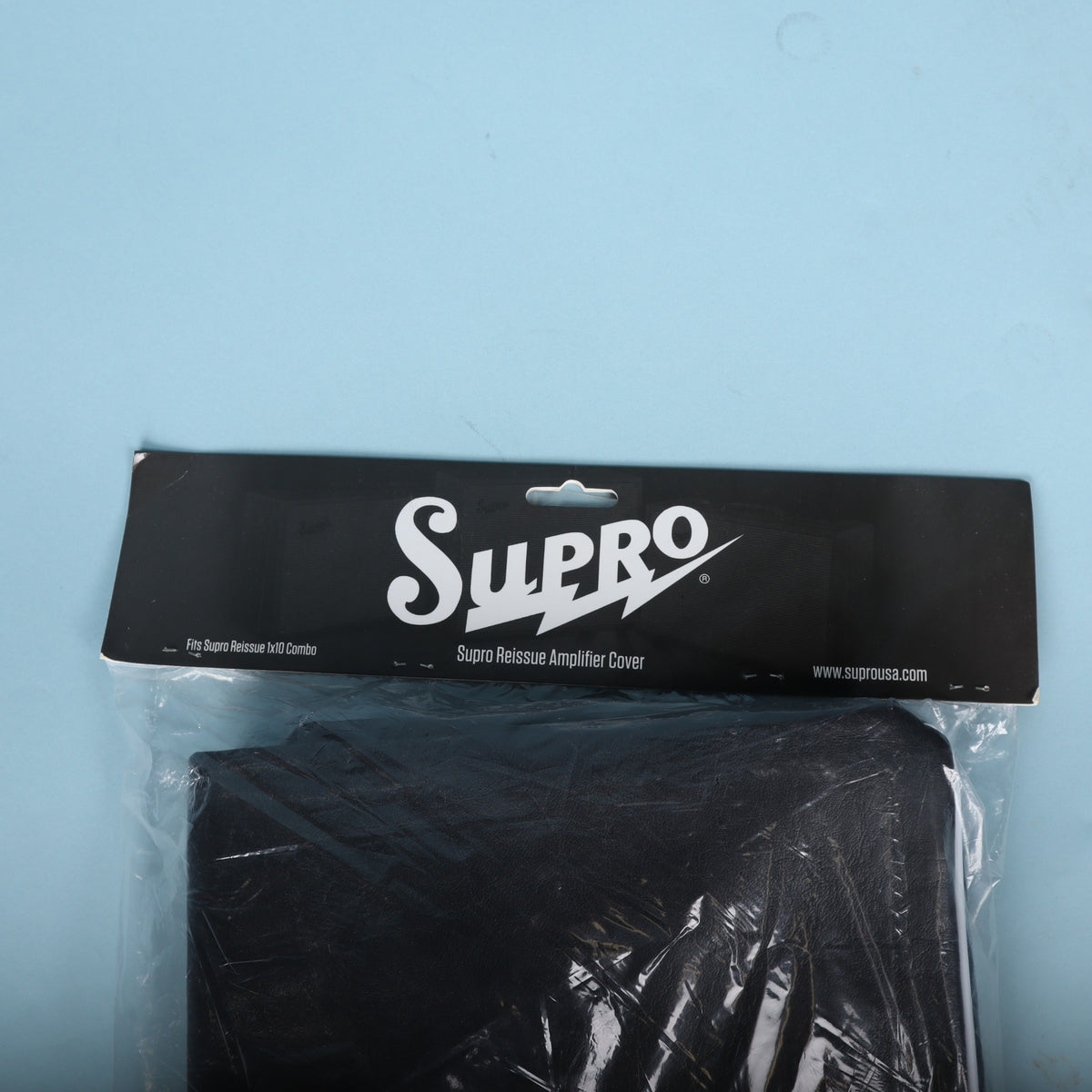 Detail view of header card displaying Supro Reissue Amplifier Cover text.