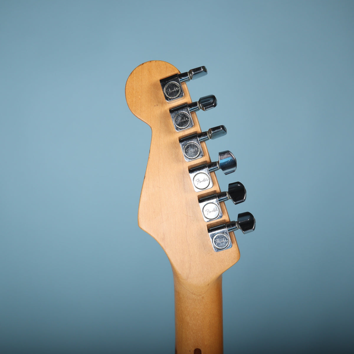 Back of headstock showing original Fender-branded tuning machines