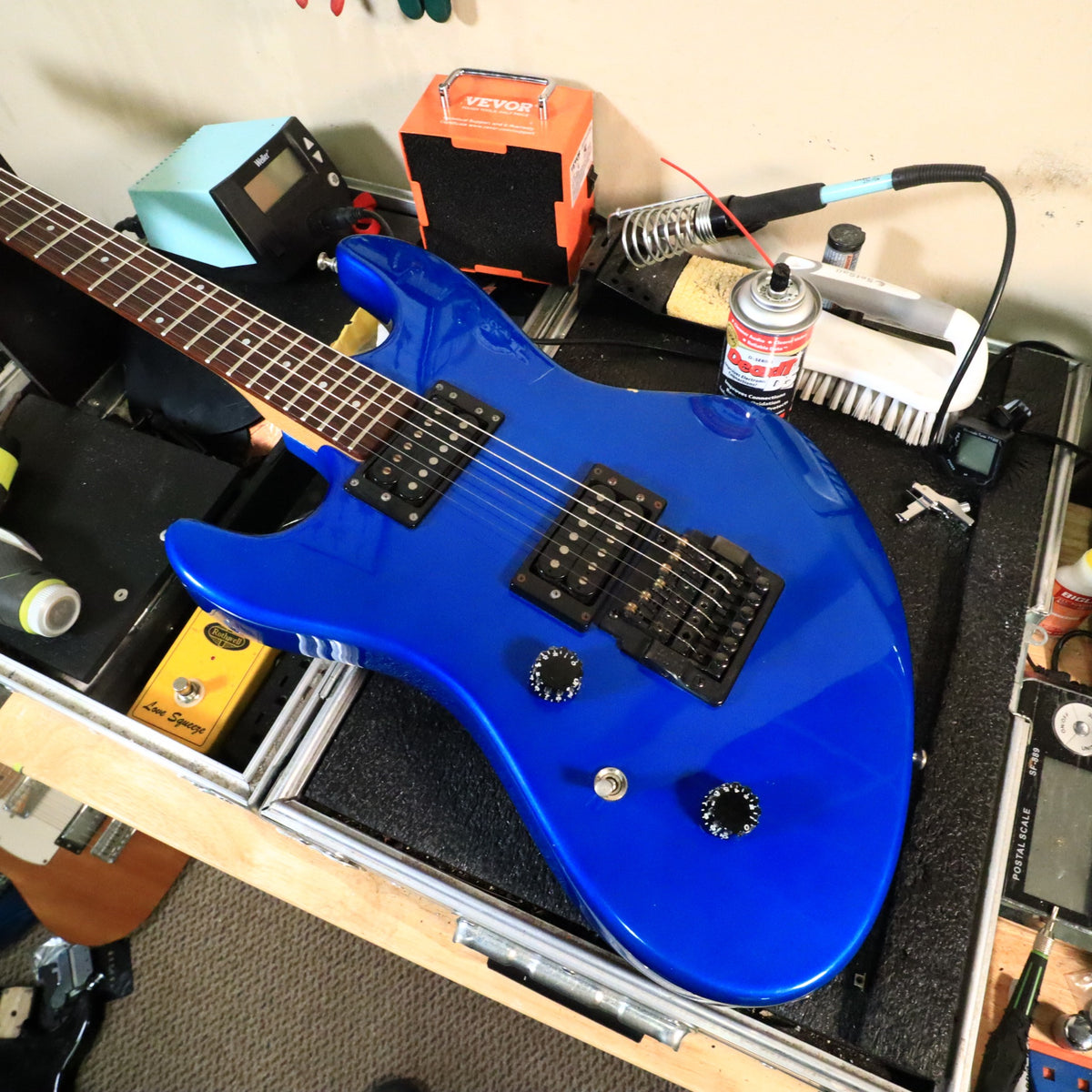 Top view of the body resting on a workbench during bench review