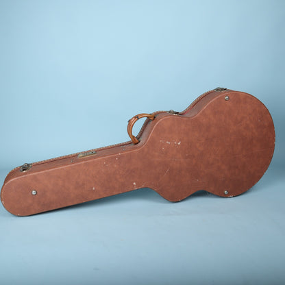 Bottom view of the closed Gibson case showing the metal support feet