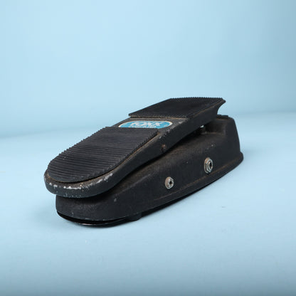 Left side profile view showing the treadle elevation and metal base