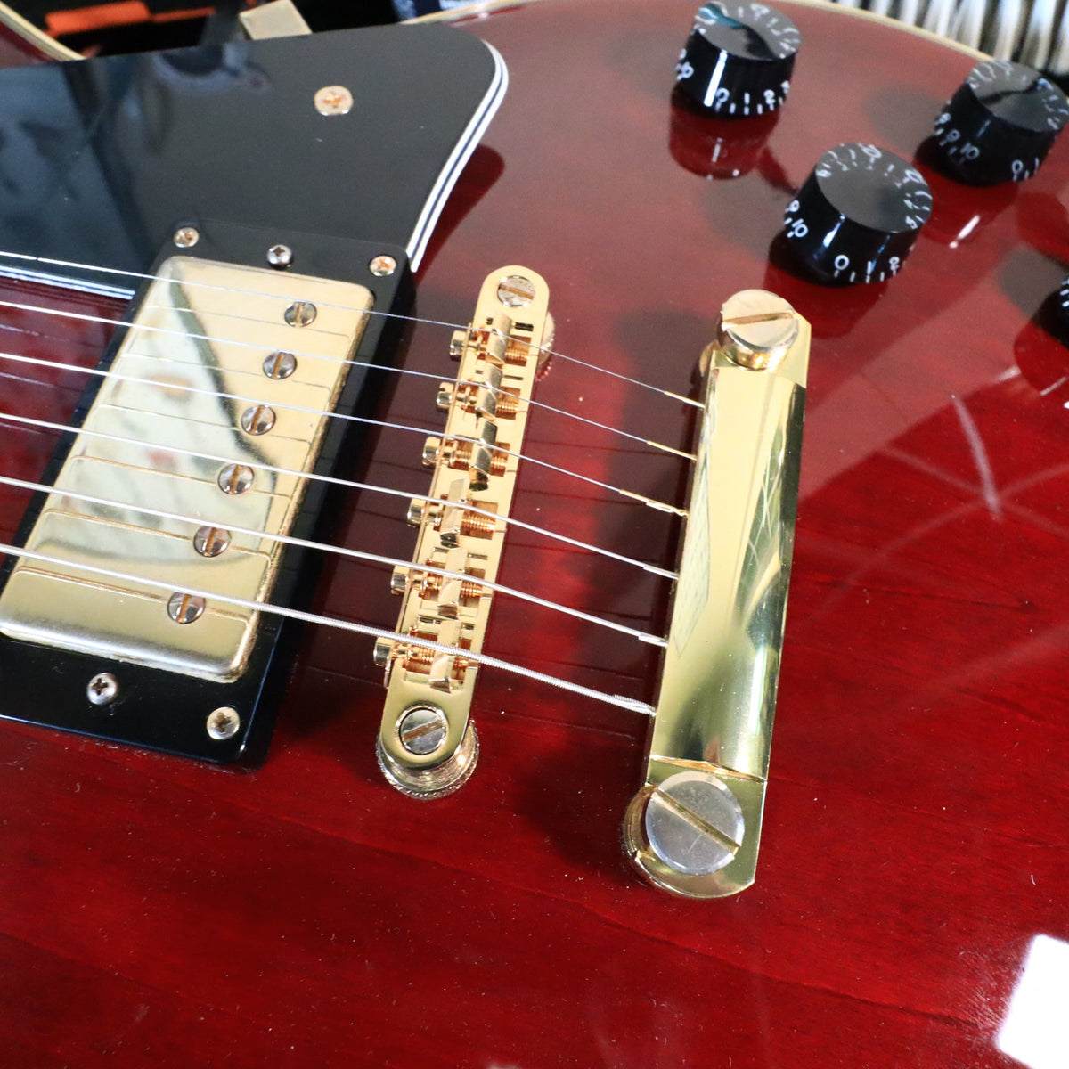 Detailed view of neck stress crack on workbench