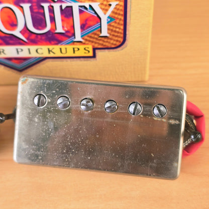 Top view of Seymour Duncan Antiquity bridge humbucker pickup with aged nickel cover