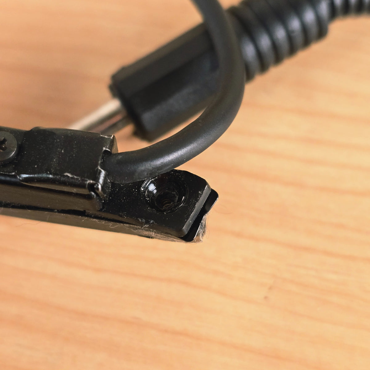 Top detail of screw mounting hole on Roland GK-2A divided pickup.