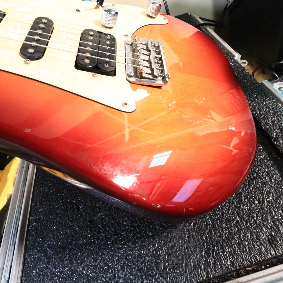 Close-up of neck heel joint cutaway showing slight finish wear marks.