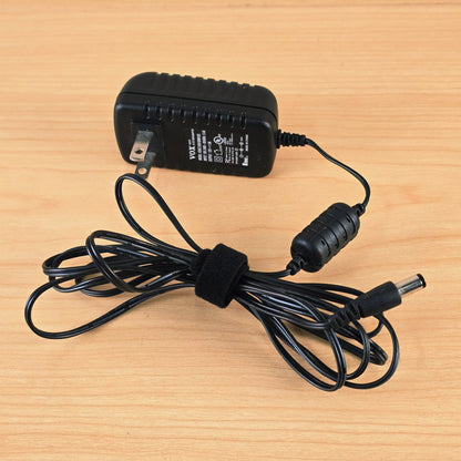 Underside of Vox KA253V adapter displaying wall prongs and specifications label