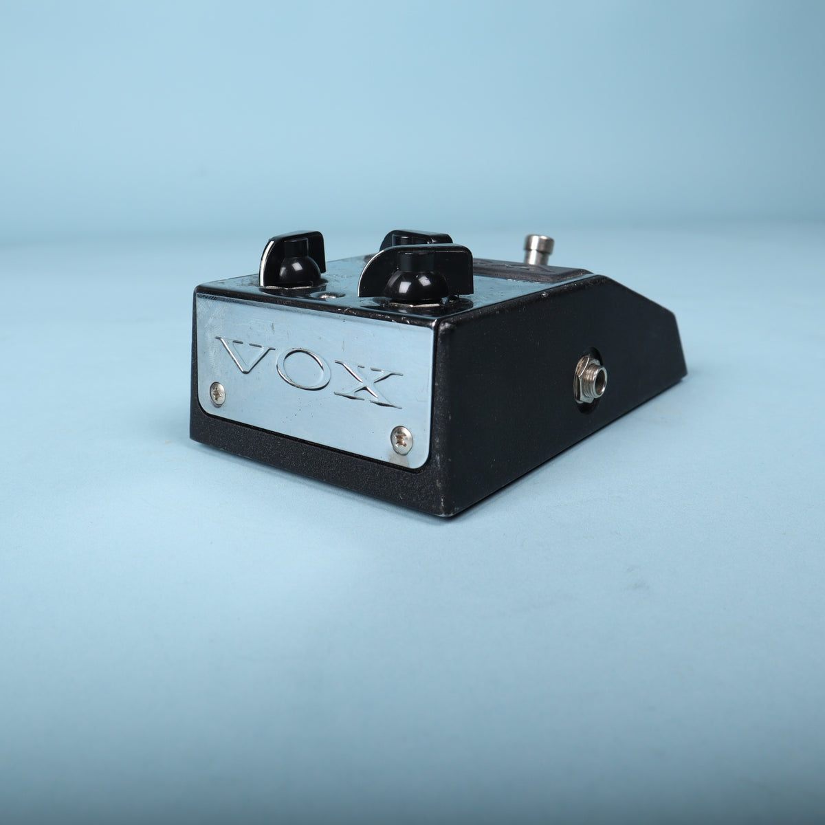 Side perspective showing the 1/4-inch jack and angled black metal chassis