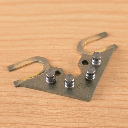 Low three-quarter view showing height of string rollers on base plate