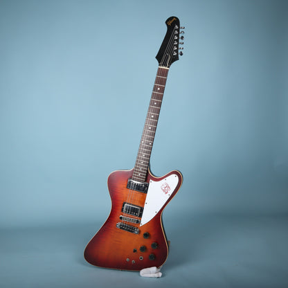 Full front view of the Gibson Firebird II Artist electric guitar standing upright.