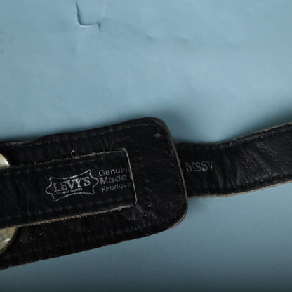 Close-up of the Levy's logo and MSSV model stamp on the black leather strap.