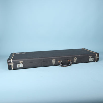 Front edge view of closed Fender case showing latches and handle