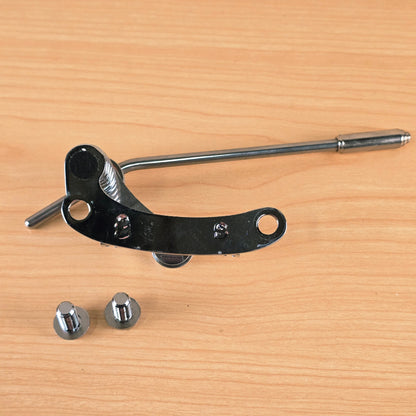 Underside view of the Duesenberg Les Trem II baseplate with two mounting studs positioned alongside.