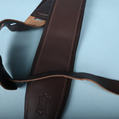 Angled view of the padded shoulder section and adjustment tail