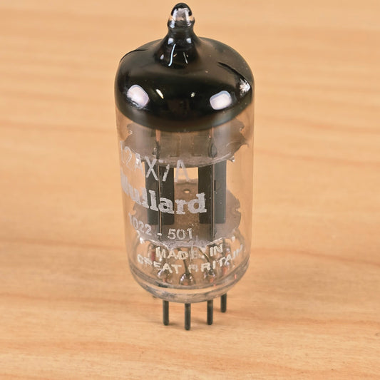 Side view of Mullard 12AX7A tube showing glass envelope and internal plates.