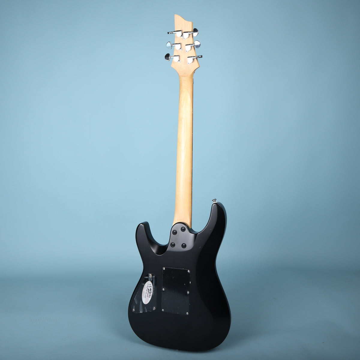 Full rear view of the Schecter C-6 Deluxe FR electric guitar showing neck and body.